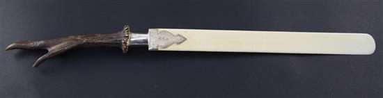 A Victorian ivory and horn handled silver mounted page turner, 21in.